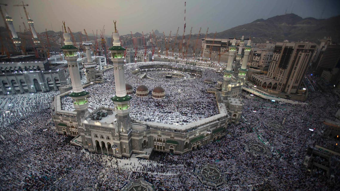 Muslim pilgrims pray at the Grand mosque in the holy city of Mecca, ahead of the annual haj pilgrimage October 10, 2013. reu