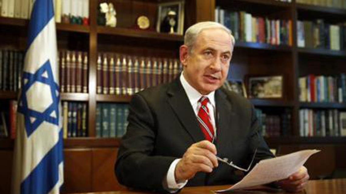 Israeli Prime Minister Benjamin Netanyahu gestures as he speaks during an interview with Reuters in Jerusalem June 17, 2013. reu