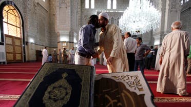 IRAQ: Sunni worshippers greet each other after attending prayers at a Sunni mosque on the first day of the Muslim festival of Eid-al-Adha in Baghdad, October 15, 2013. (Reuters)