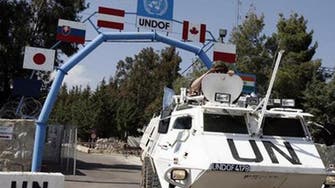 Syria hands over missing Canadian staffer to U.N.