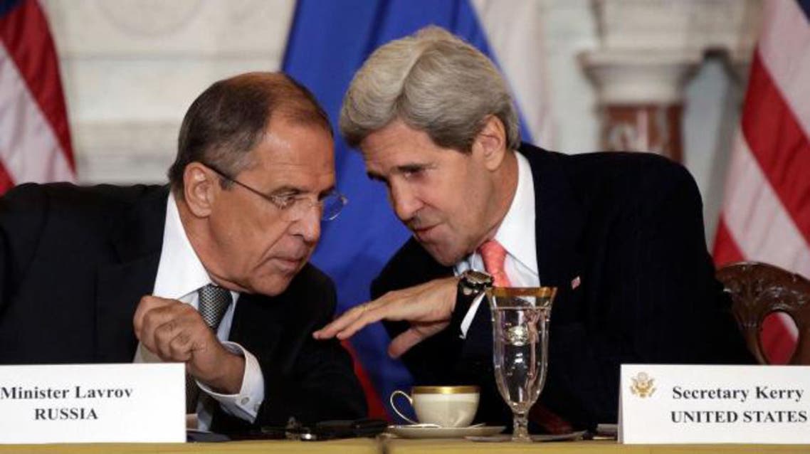 Russian Foreign Minister Sergey V. Lavrov (L) talks with U.S. Secretary of State John Kerry during a meeting at the U.S. State Department on August 9, 2013 in Washington, DC. AFP