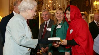 Malala all smiles as she meets Queen Elizabeth 