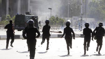 Egypt orders arrest of policemen for killing detained Islamists