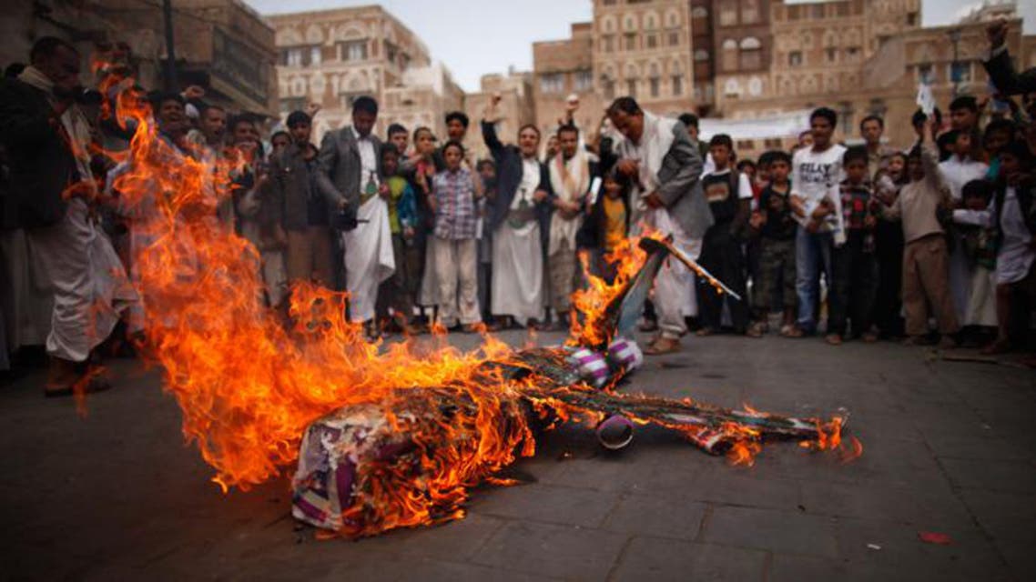 Demonstrators in Yemen burn an effigy of a U.S. aircraft during a demonstration to protest against what they say is U.S. interference in Yemen, including drone strikes. (File photo: Reuters)
