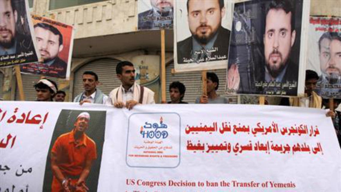 Sana’a protesters hold banners with pictures of what they say are Yemeni detainees at the Guantanamo. (File photo: Reuters)