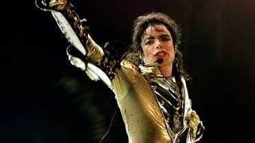 American pop-star Michael Jackson performs during his "HIStory World Tour" concert in Vienna in July 2, 1997. Jackson regained the title of the highest-earning dead celebrity in the past year. (Reuters)