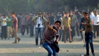 Tear gas fired to disperse pro-Mursi protesters in Cairo 