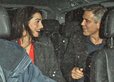 George Clooney and his alleged new girlfriend, Lebanese lawyer Amal Alamuddin, leaving a restaurant in London last week. (Photo courtesy Twitter, via: ibtimes.com)