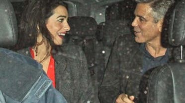 George Clooney and his alleged new girlfriend, Lebanese lawyer Amal Alamuddin, leaving a restaurant in London last week. (Photo courtesy Twitter, via: ibtimes.com)