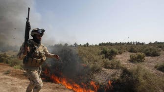 Suicide bombers kill 11 military, police in Iraq dinner attack