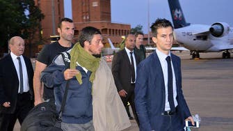 French ex-hostages land in Paris after the ‘test of a lifetime’ 
