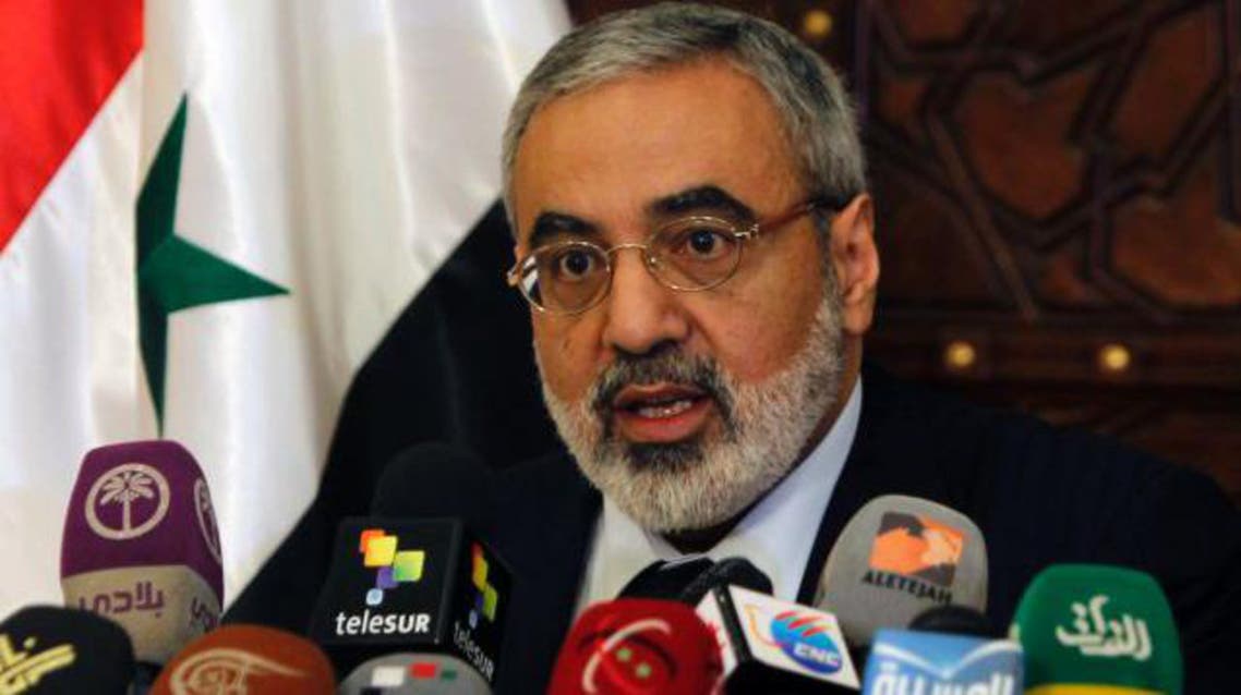 Syrian Information Minister Omran Zoabi speaks during a news conference in Damascus earl8ier this year. (File photo: Reuters)