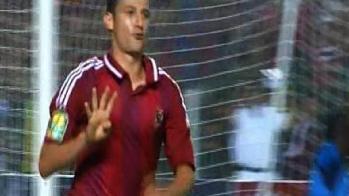 أحمد عبد الظاهر مهاجم الأهلي يرفع شعار رابعة في نهائي دوري ابطال افريقيا