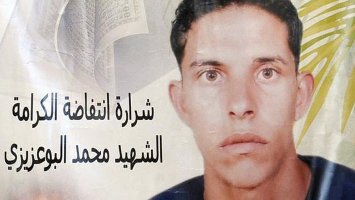 A poster featuring Mohamed Bouazizi, the Tunisian fruitseller whose self-immolation in December 2010, ignited the Arab spring. PhotoAFP