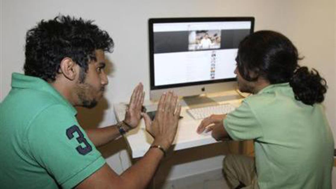 Members of the Uturn comedian group work on a Youtube video in Jeddah March 26, 2012. (Reuters)