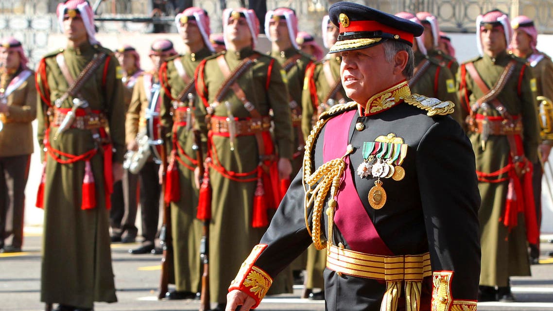 Jordan's King Abdullah walks during the opening of the 17th Ordinary Session of Parliament in Amman November 3, 2013. reuters