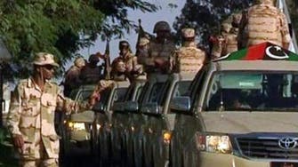جيش ليبيا يجلي عمالاً أجانب من مرفأ محاصر