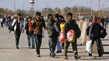 Afghans leaving Iran (Reuters)