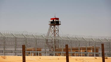 An observation tower painted in the colours of the Egyptian national flag is seen near the Nitzana crossing, along Israel's border with Egypt's Sinai desert August 20, 2013. 