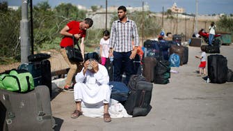 Syrian, Palestinian refugees held in Egypt begin hunger strike