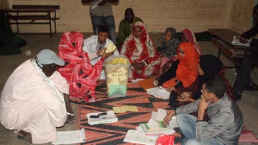 Election workers count ballots late on November 23, 2013 in Nouakchott following nationwide elections. (AFP)