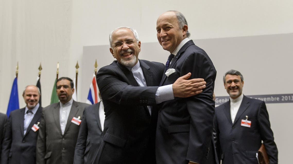 AFP Fabius Zarif hug