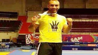 Egyptian Kung Fu champion defiant over display of ‘Rabaa’ symbol