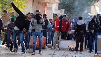 Around 32 hurt as Tunisia strike turns violent