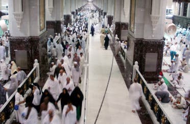 Muslim pilgrims walk at Al-Safa and Al-Marwah (Safa and Marwah) where Muslims walk back and forth seven times during the ritual pilgrimages of Haj and Umrah at the Grand Mosque, during the annual haj pilgrimage in Mecca October 17, 2012. (Reuters)