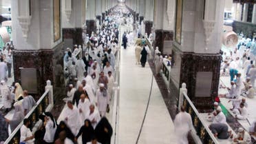Muslim pilgrims walk at Al-Safa and Al-Marwah (Safa and Marwah) where Muslims walk back and forth seven times during the ritual pilgrimages of Haj and Umrah at the Grand Mosque, during the annual haj pilgrimage in Mecca October 17, 2012. (Reuters)
