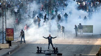 Egypt court acquits 155 Cairo protesters 