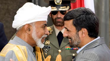 The then Iranian President Mahmoud Ahmadinejad greets Oman’s Sultan Qaboos bin Saeed during a welcoming ceremony in Tehran in August 2009. (File photo: Reuters)