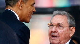 Obama shakes hands with Cuba’s Castro at Mandela memorial 