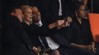 Wrong time for a selfie? Obama snap at Mandela memorial creates stir