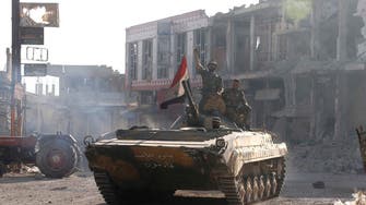 Syrian army aims to expel rebels from town on road to capital 