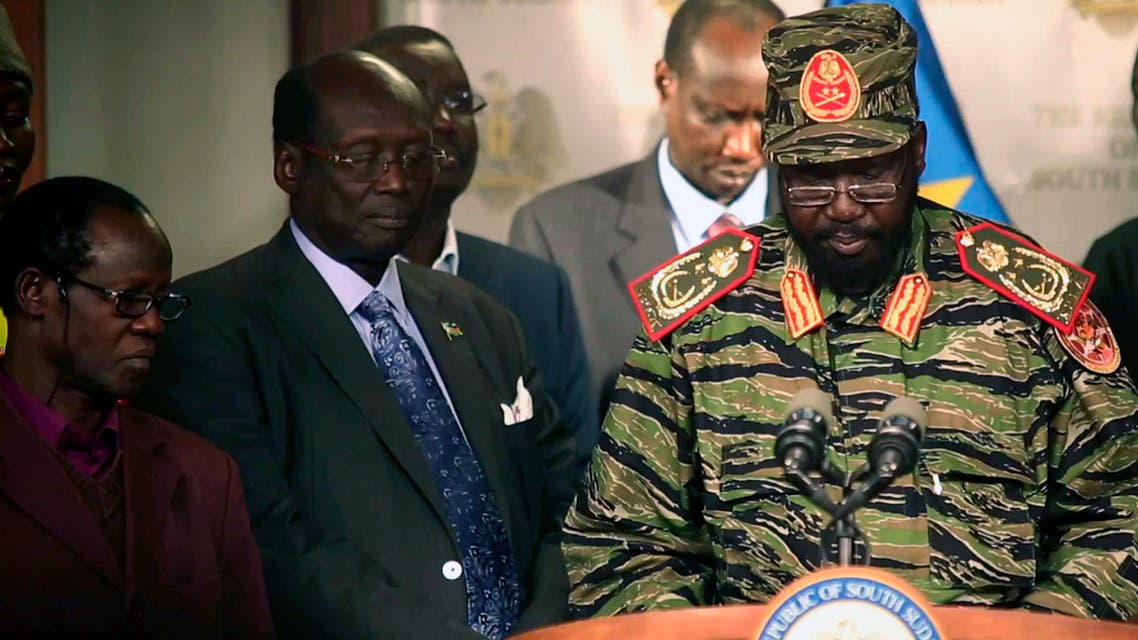 South Sudan's President Salva Kiir (R) addresses a news conference at the Presidential Palace in capital Juba December 16, 2013. reuters