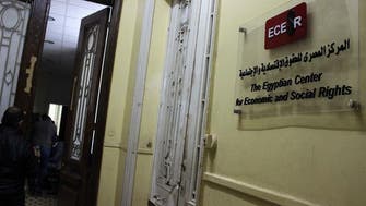 Egypt activist wanted for trial caught in NGO raid