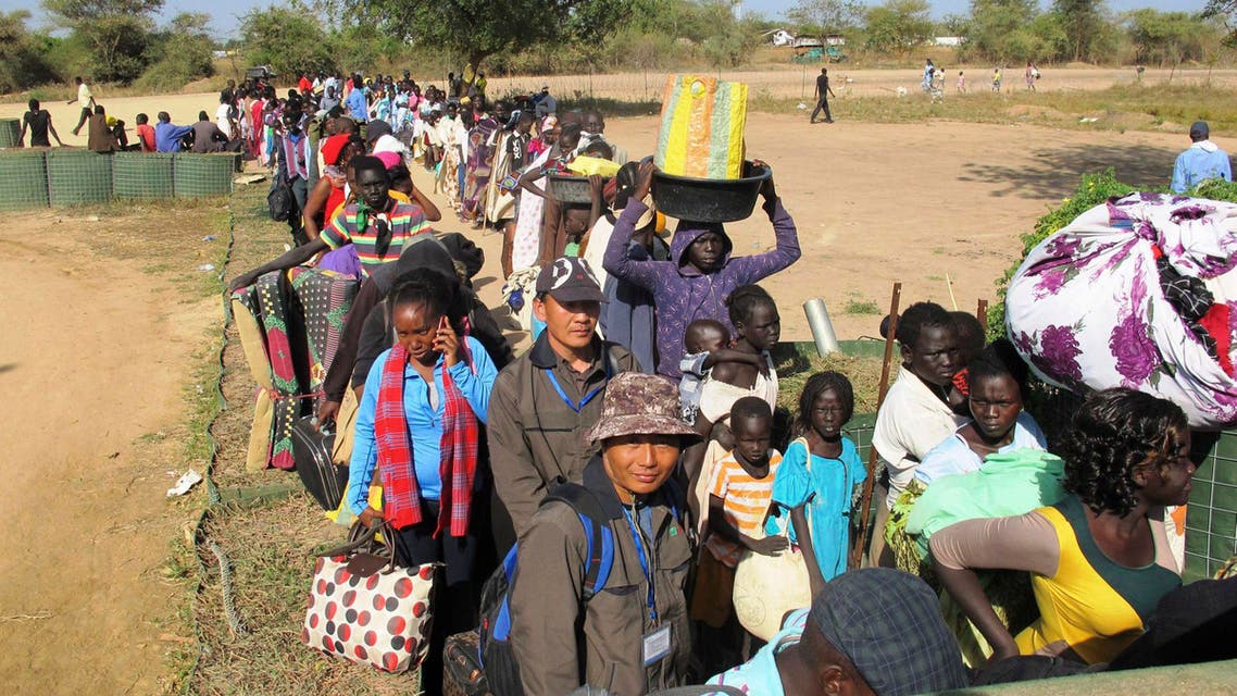 Civilians arrive for shelter at the United Nations Mission in the Republic of South Sudan (UNMISS) compound in Bor, South Sudan in this Dec. 18, 2013 picture provided by the UNMISS. Reuters