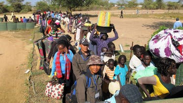 Civilians arrive for shelter at the United Nations Mission in the Republic of South Sudan (UNMISS) compound in Bor, South Sudan in this Dec. 18, 2013 picture provided by the UNMISS. Reuters 