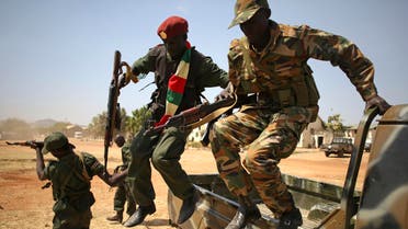 SPLA soldiers jump from a vehicle in Juba December 21, 2013.