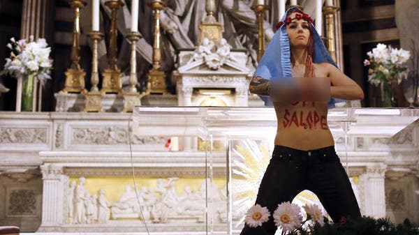 اعتراض زنان سینه برهنه فیمن در اسپانیا علیه قانون ممنوعیت سقط جنین 