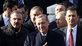 Battered Erdogan seen weathering storm as scandal deepens