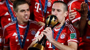 Germany’s Bayern Munich Franck Ribery kisses the trophy as he celebrates with his team mates after winning their 2013 FIFA Club World Cup final soccer match against Morocco's Raja Casablanca at Marrakech stadium Dec. 21, 2013. (Reuters)