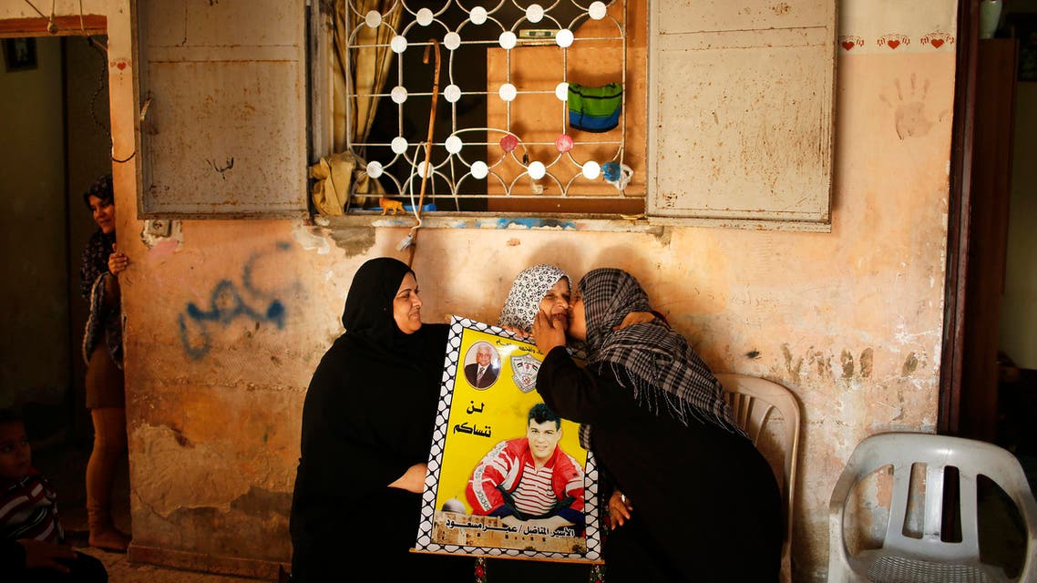 A relative of Palestinian prisoner Omar Massoud, who was held by Israel since 1993, pictured after hearing news on the expected release of Omar. (File photo: Reuters)