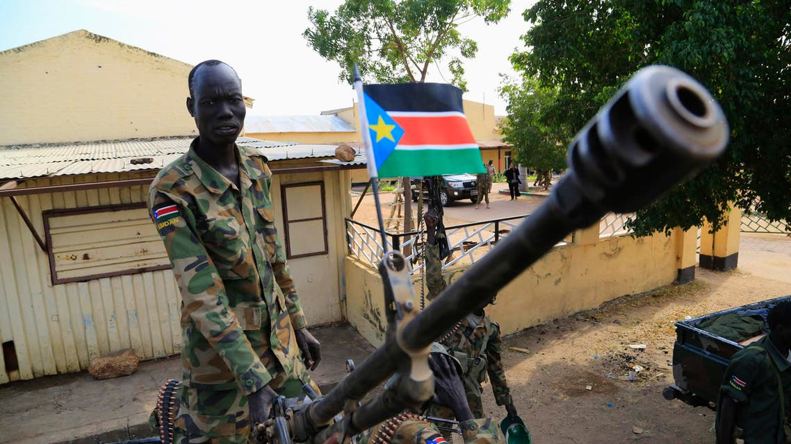 A South Sudan army soldier stands next to a machine gun mounted on a truck in Malakal town, 497km (308 miles) northeast of capital Juba, December 30, 2013 after retaking the town from rebel fighters. (Reuters)