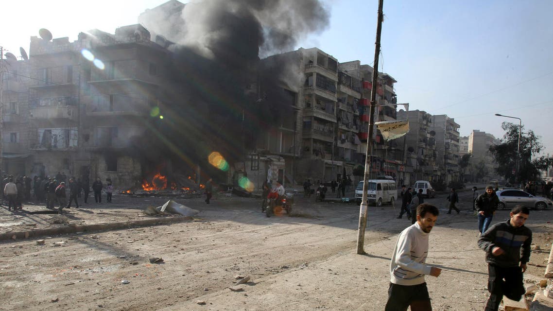 People run after an air raid in Aleppo on Dec. 24, 2013. The Committee to Protect Journalists says 29 journalists have died covering the civil war in Syria. (File photo: Reuters)