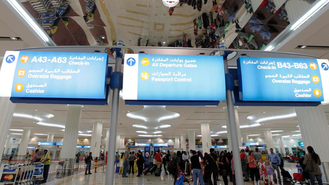 Travellers are seen at the Emirates terminal at Dubai International Airport, Jan. 7, 2013. (File photo: Reuters)