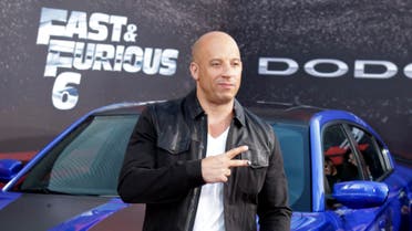 Cast member and producer Vin Diesel poses at the premiere of the new film, "Fast & Furious 6" at Universal Citywalk in Los Angeles May 21, 2013.