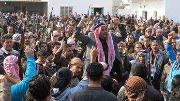 Residents gather to protest near the house of prominent Sunni Muslim lawmaker Ahmed al-Alwani, in the centre of Ramadi, December 29, 2013