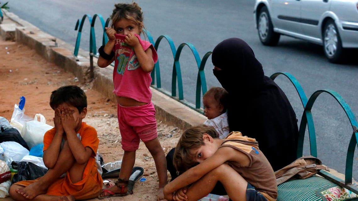 Homeless Syrian children are seen along a street in Beirut July 22, 2013. (Reuters)